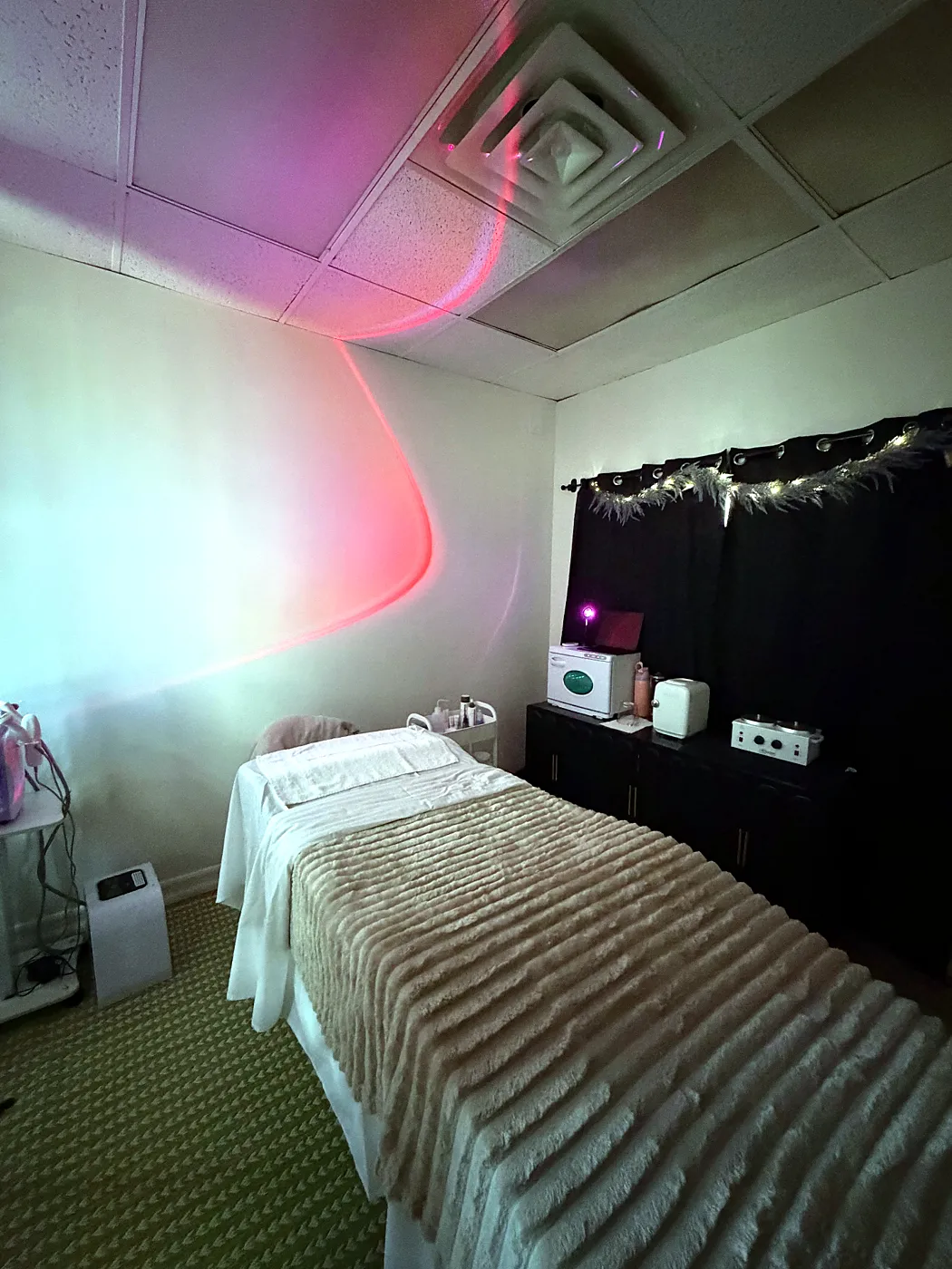 Emily's treatment suite with a treatment bed